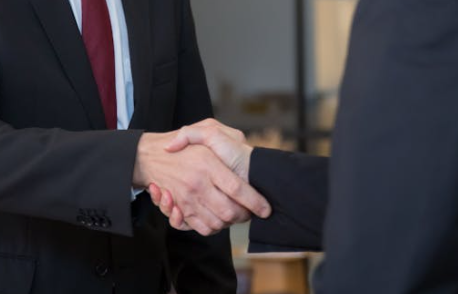 Partnership and collaboration — two people connecting